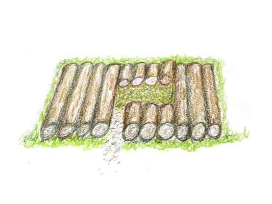 Première couche de rondins avec le nid en litière de feuilles mortes et foin.jpg